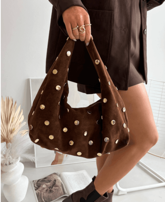 Verstos odos rankinė – stilinga, elegantiška ir funkcionali, su aukštos kokybės dizaino akcentais kasdienai ir progoms