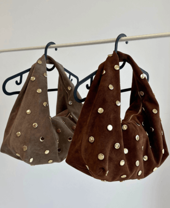 Verstos odos rankinė – stilinga, elegantiška ir funkcionali, su aukštos kokybės dizaino akcentais kasdienai ir progoms