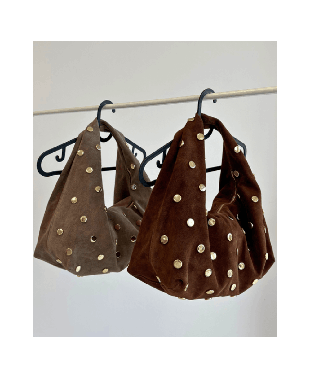 Verstos odos rankinė – stilinga, elegantiška ir funkcionali, su aukštos kokybės dizaino akcentais kasdienai ir progoms