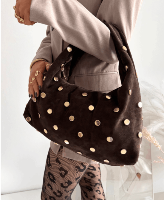 Verstos odos rankinė – stilinga, elegantiška ir funkcionali, su aukštos kokybės dizaino akcentais kasdienai ir progoms