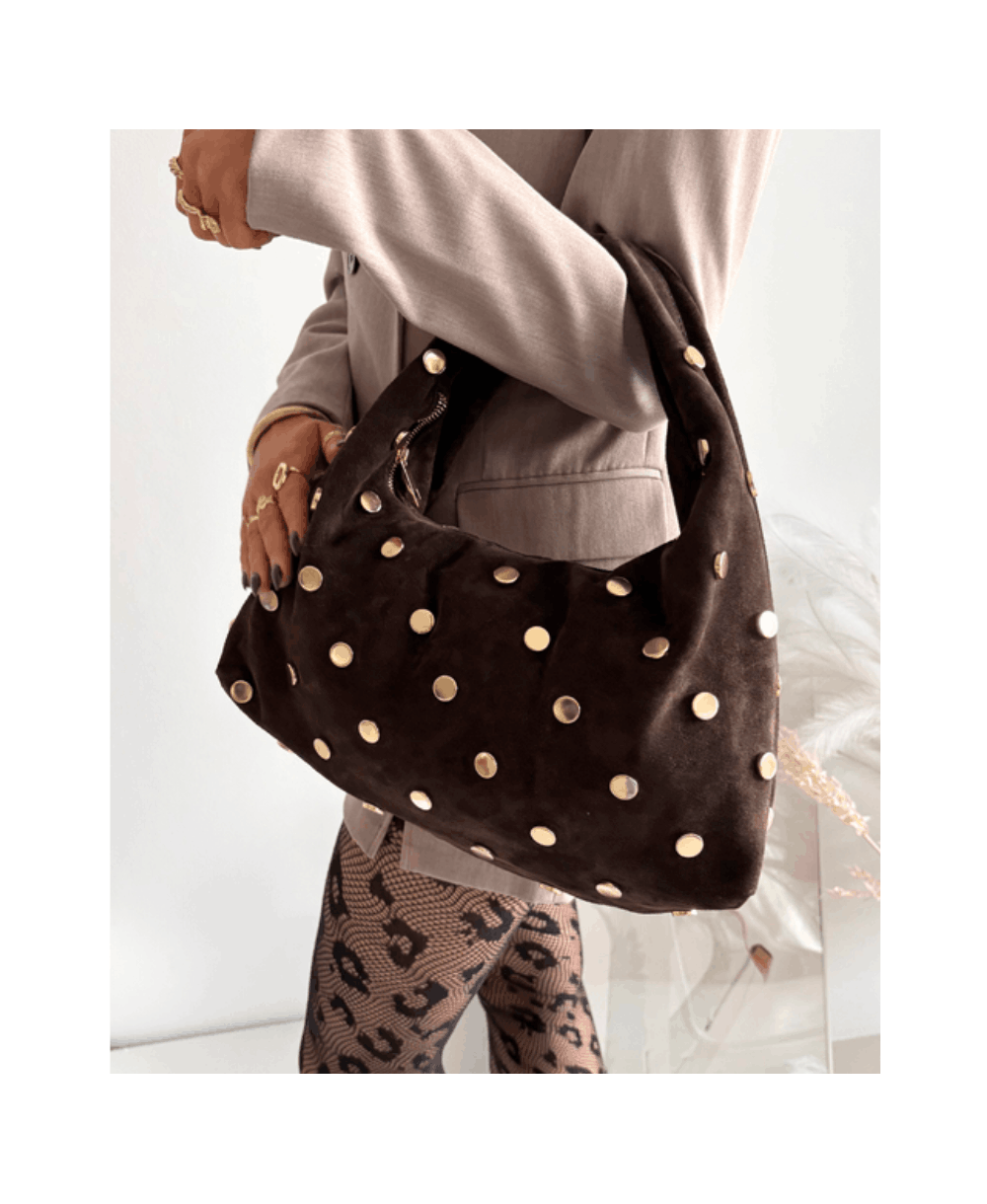 Verstos odos rankinė – stilinga, elegantiška ir funkcionali, su aukštos kokybės dizaino akcentais kasdienai ir progoms